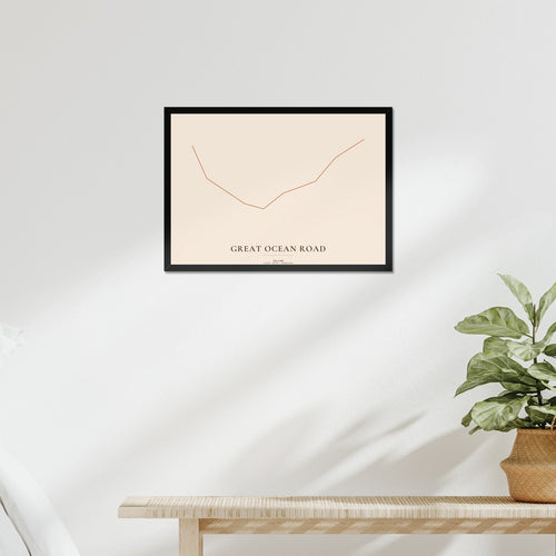 Example activity map poster in a black frame above a bed