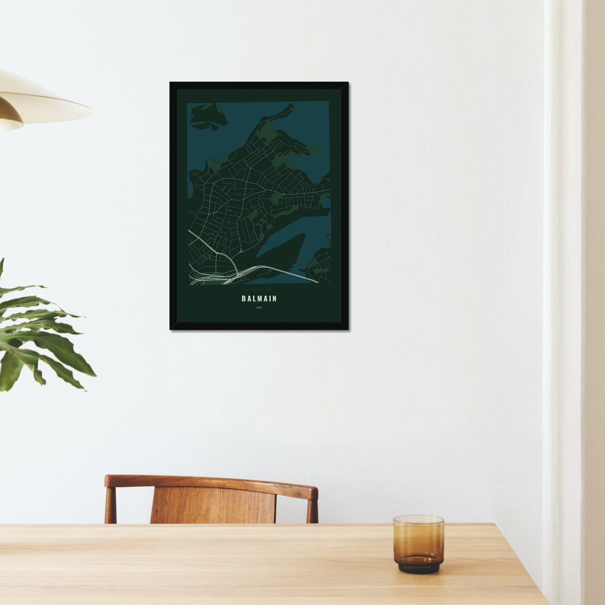 Balmain Map poster in a black frame on a dining room wall