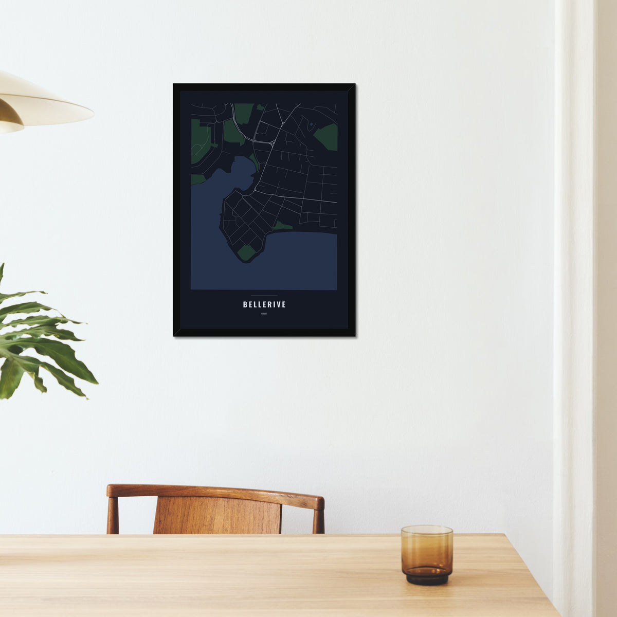 Bellerive Map poster in a black frame on a dining room wall