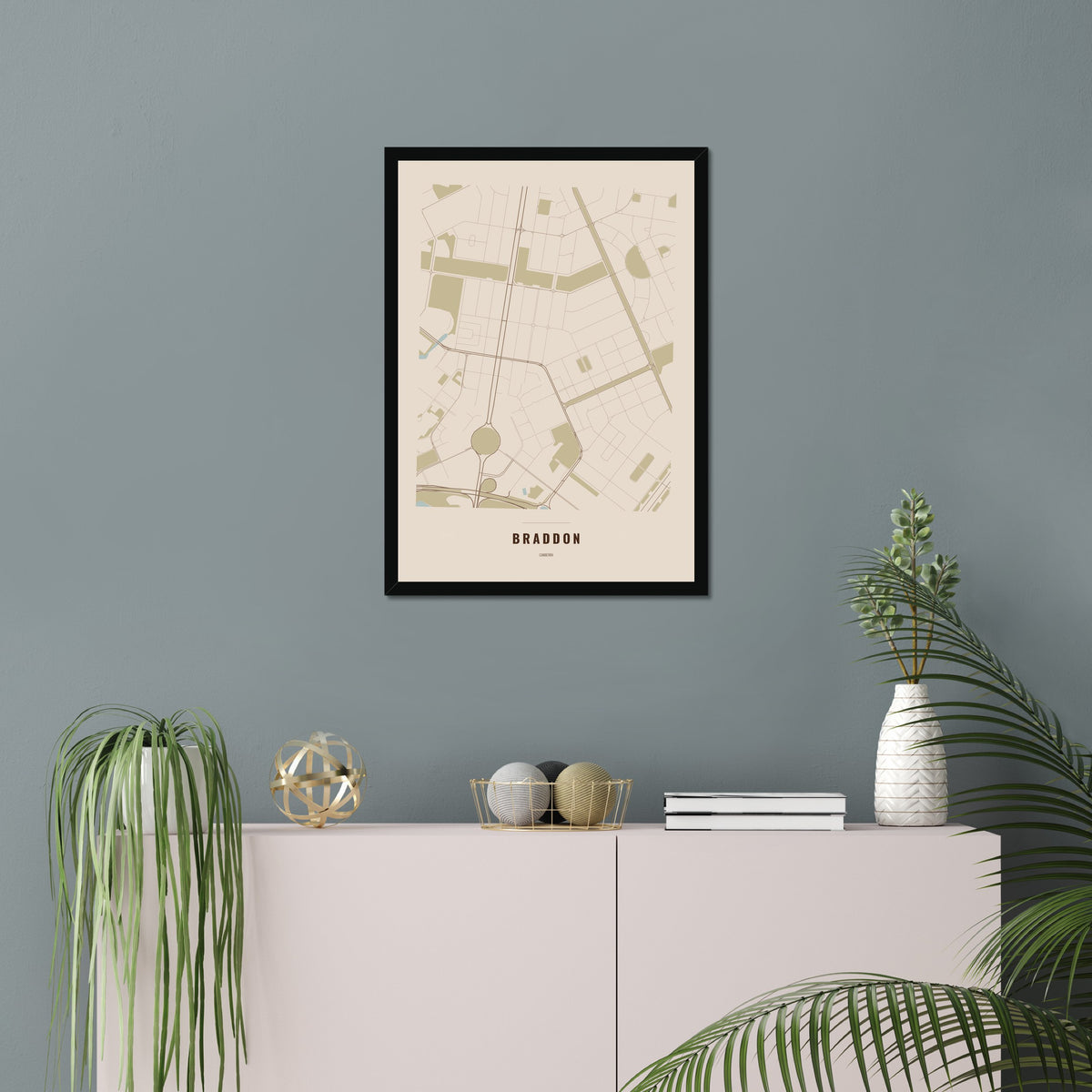 Braddon Map poster in a black frame in a living room
