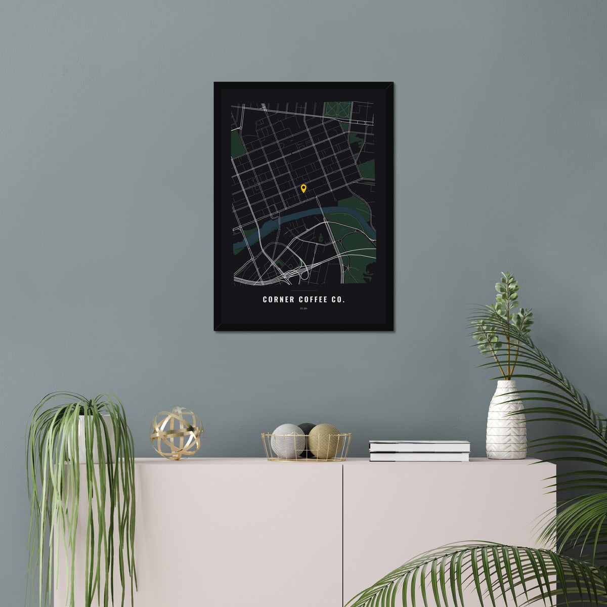 Business Location Map poster in a black frame in a living room