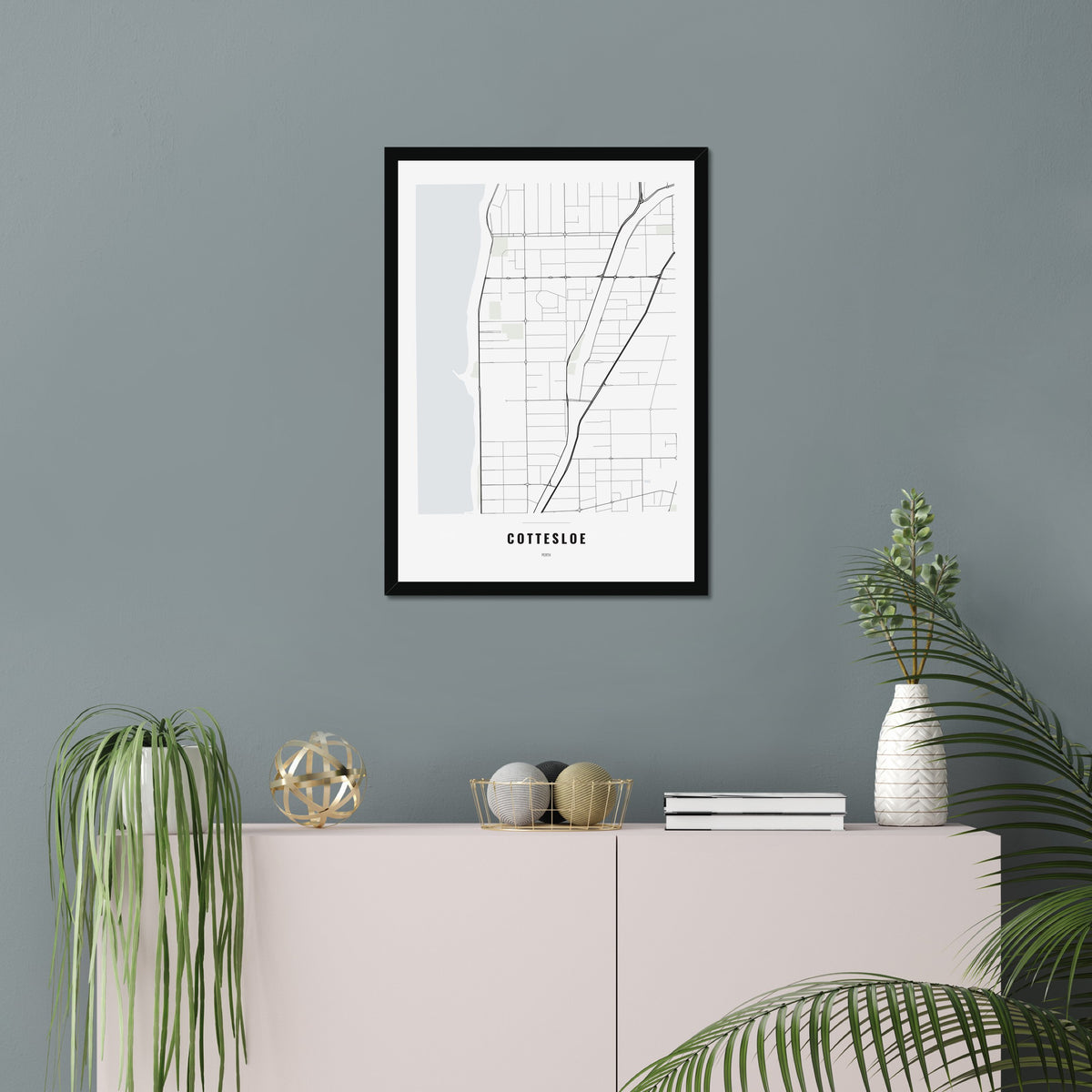 Cottesloe Map poster in a black frame in a living room