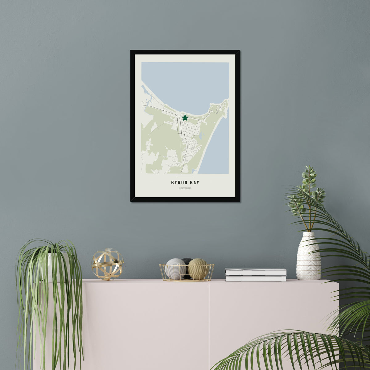 Favourite Place Map poster in a black frame in a living room