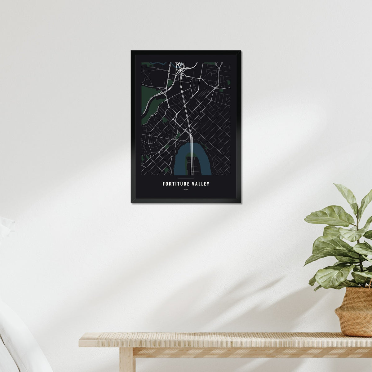 Fortitude Valley Map poster in a black frame above a bed