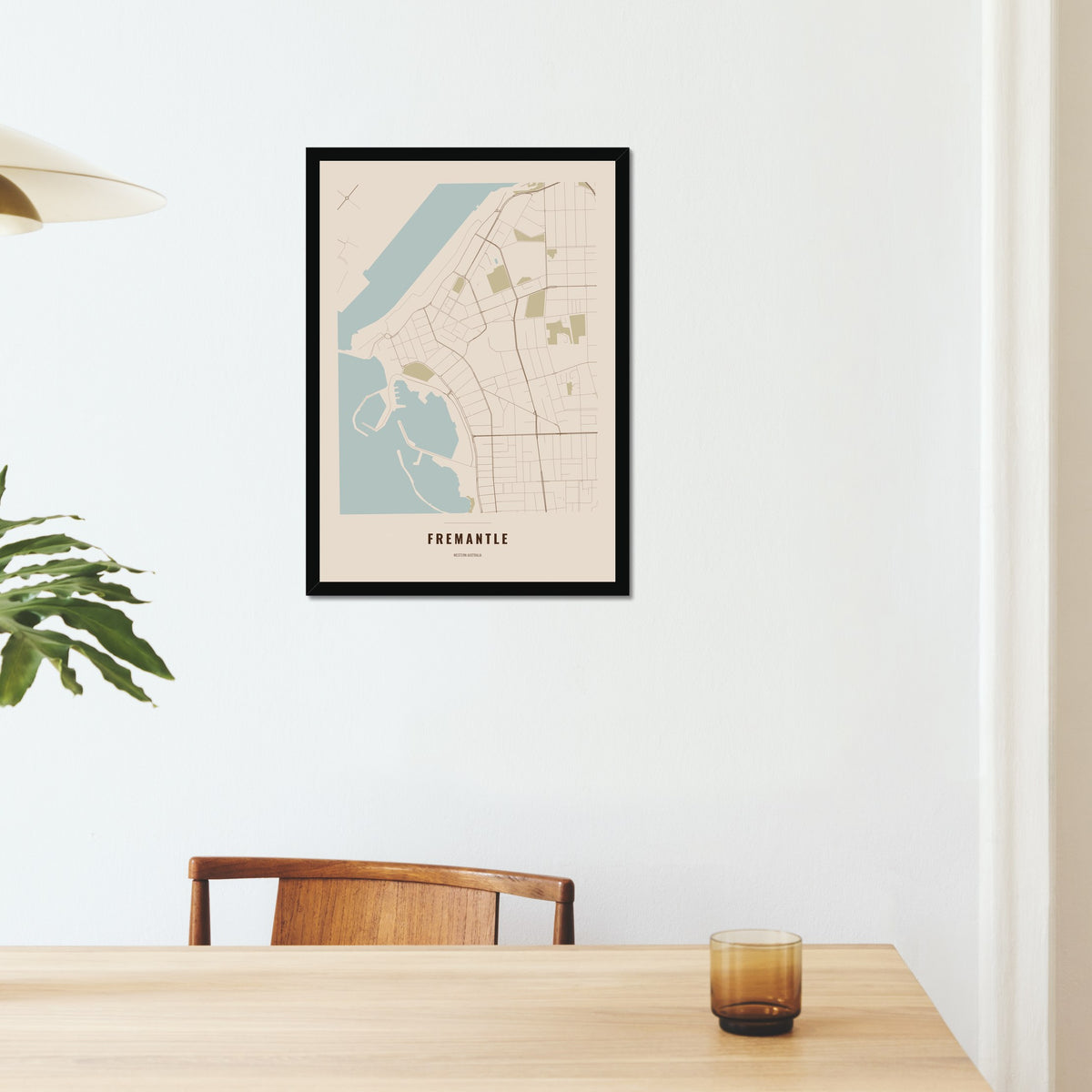 Fremantle Map poster in a black frame on a dining room wall
