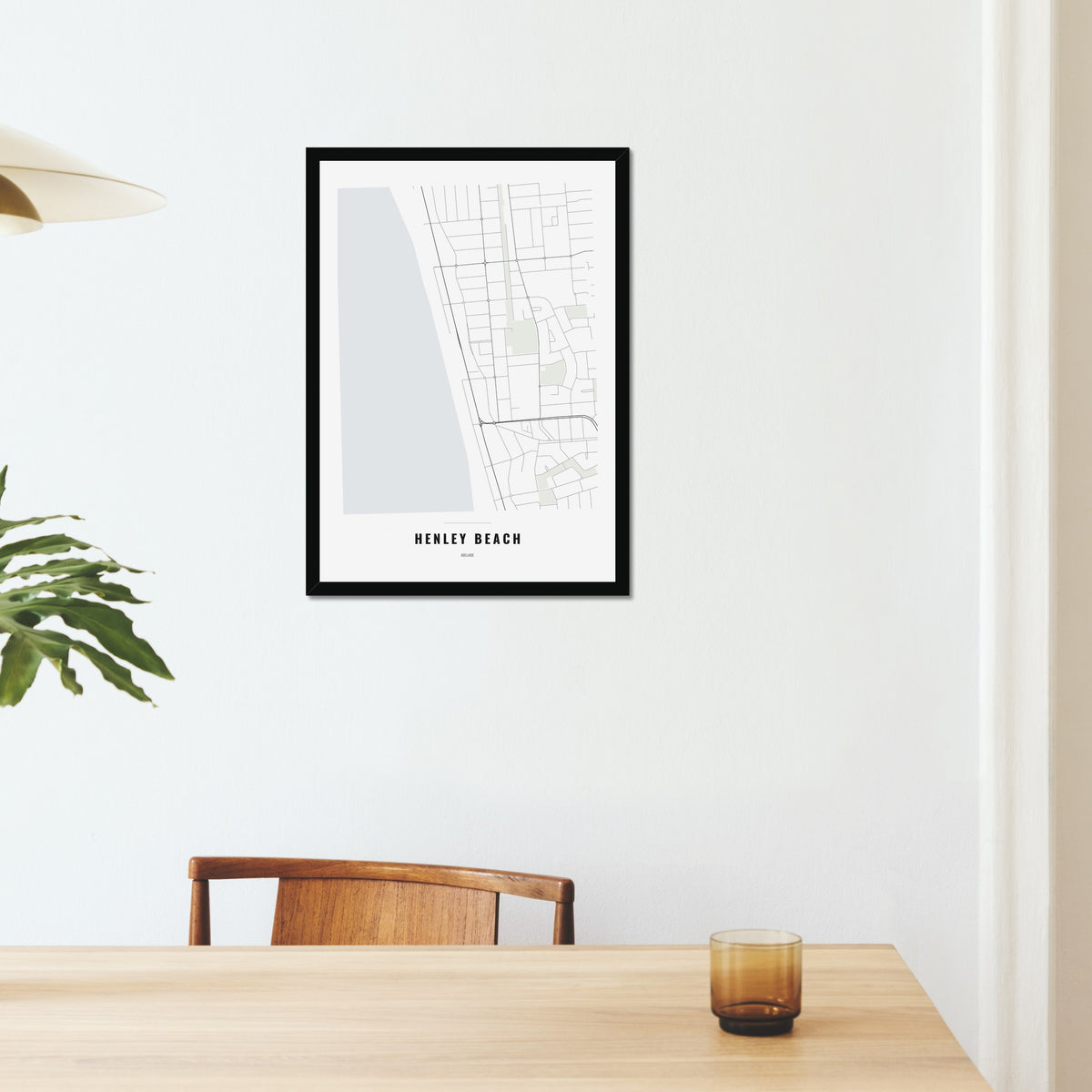 Henley Beach Map poster in a black frame on a dining room wall
