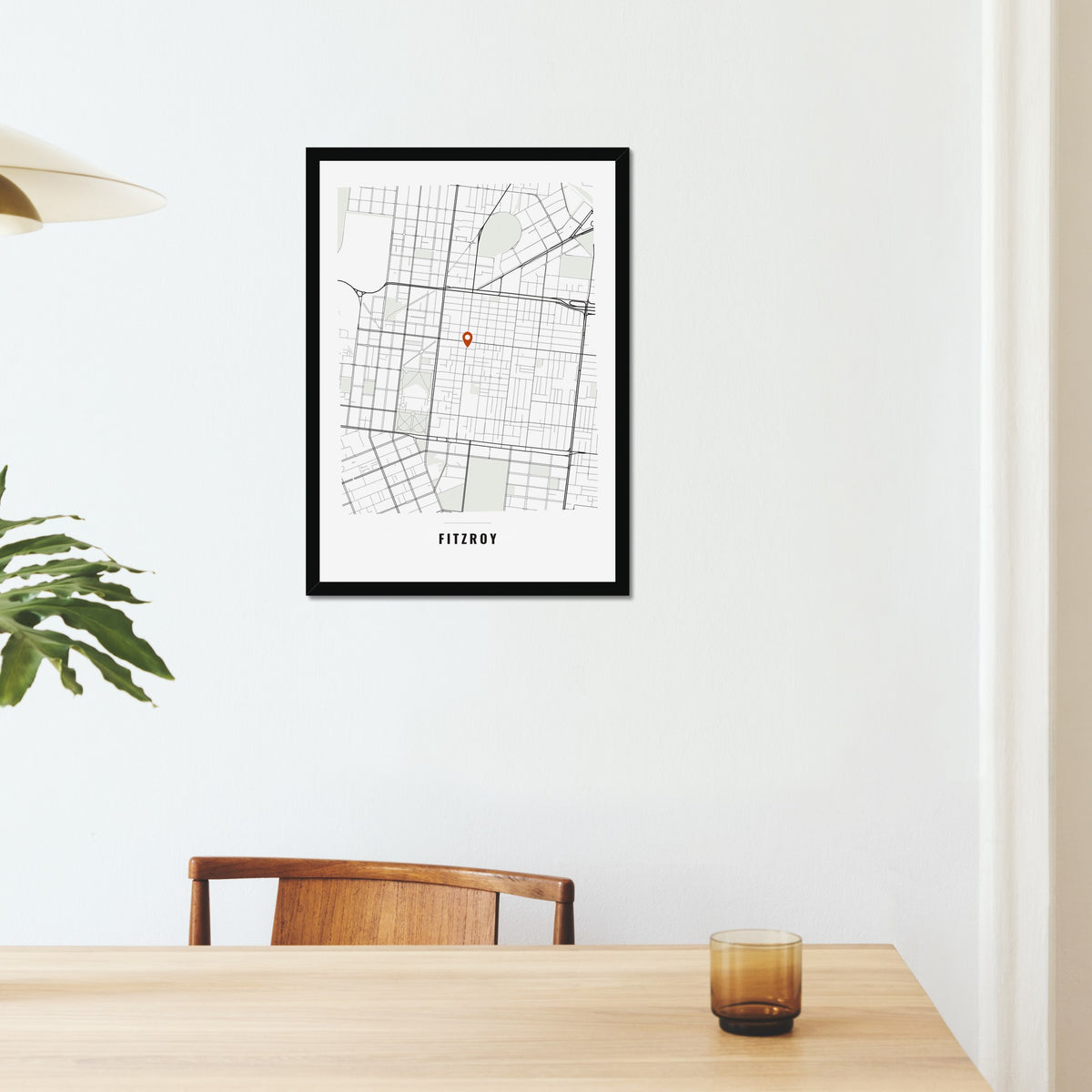 Local Area Map poster in a black frame on a dining room wall