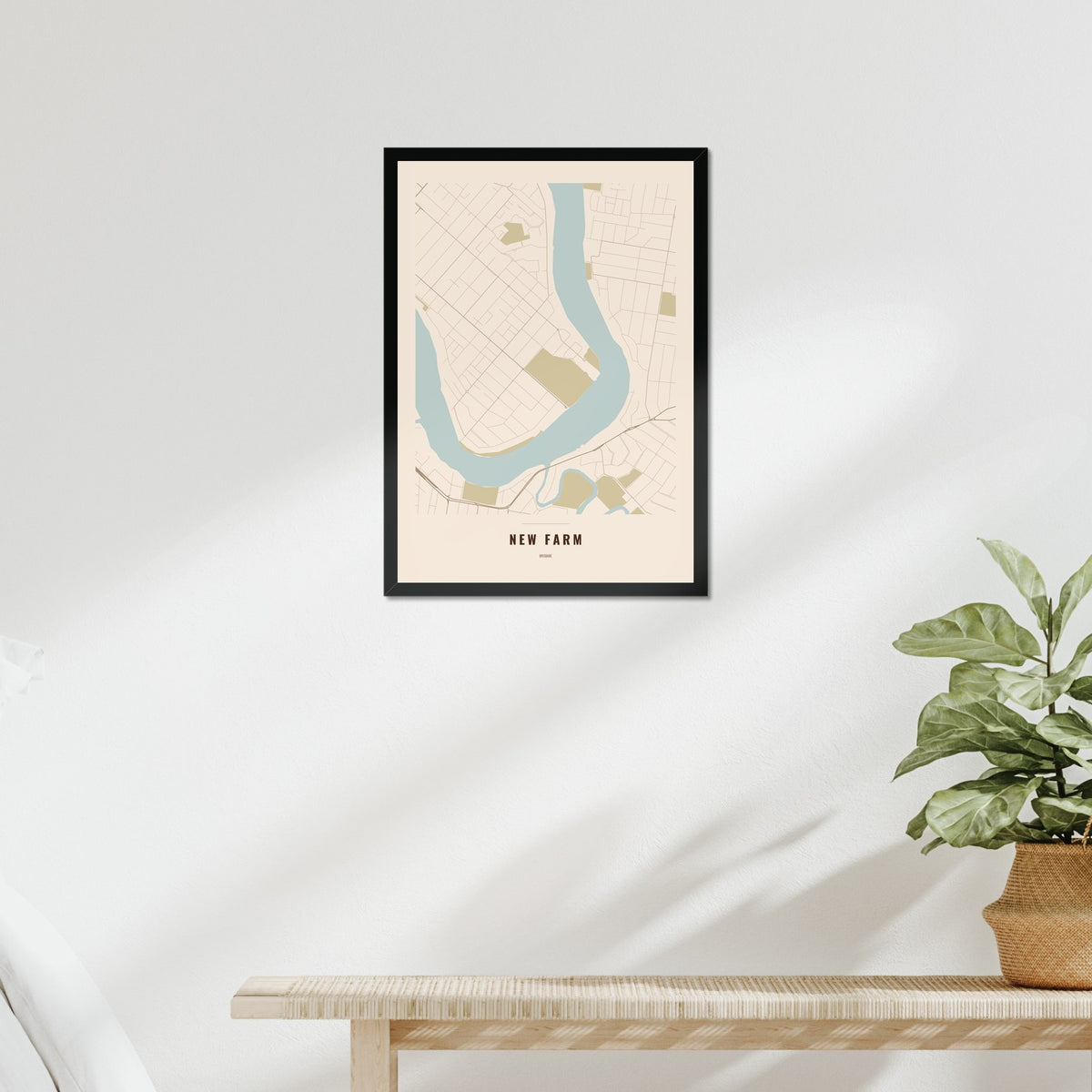 New Farm Map poster in a black frame above a bed