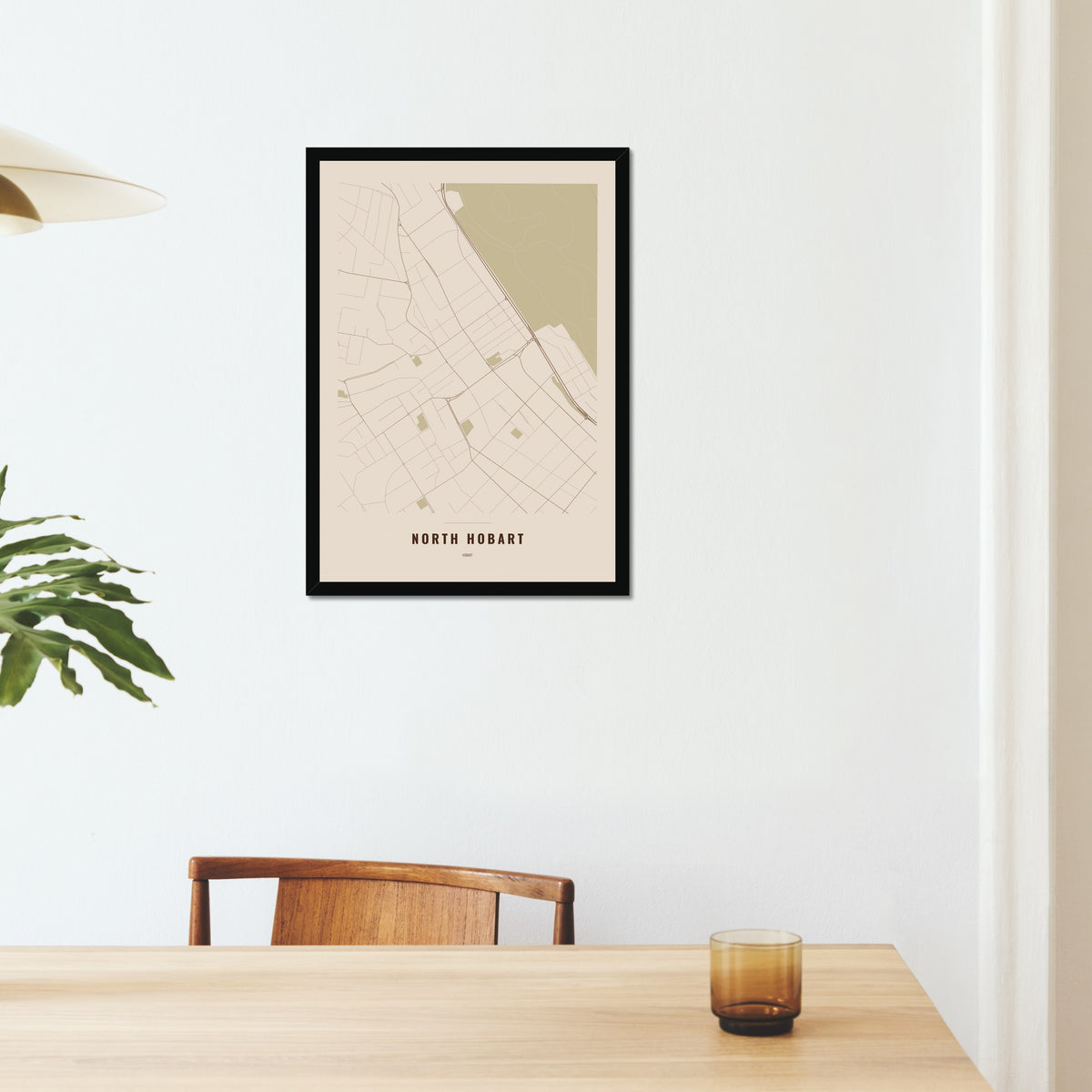 North Hobart Map poster in a black frame on a dining room wall