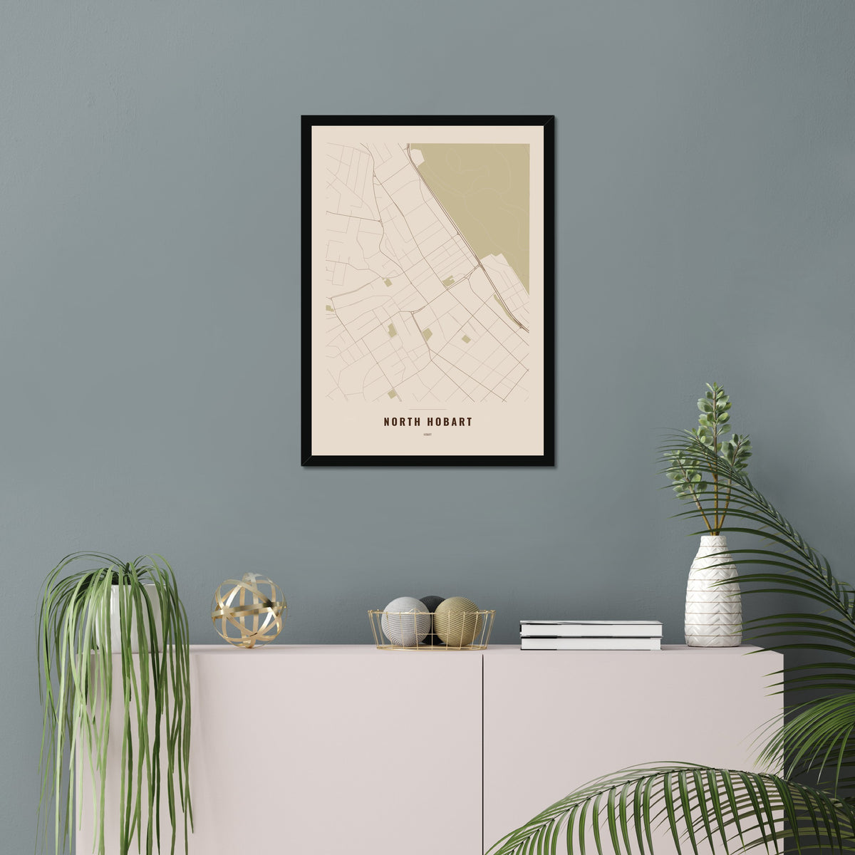 North Hobart Map poster in a black frame in a living room