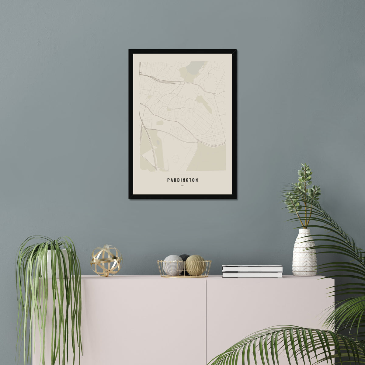 Paddington Map poster in a black frame in a living room
