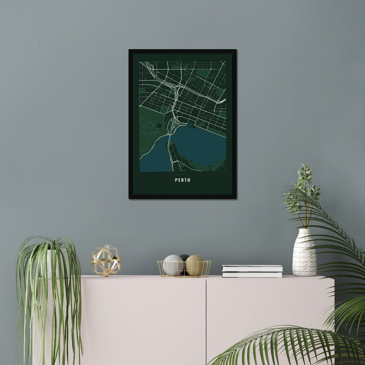 Perth City Map poster in a black frame in a living room