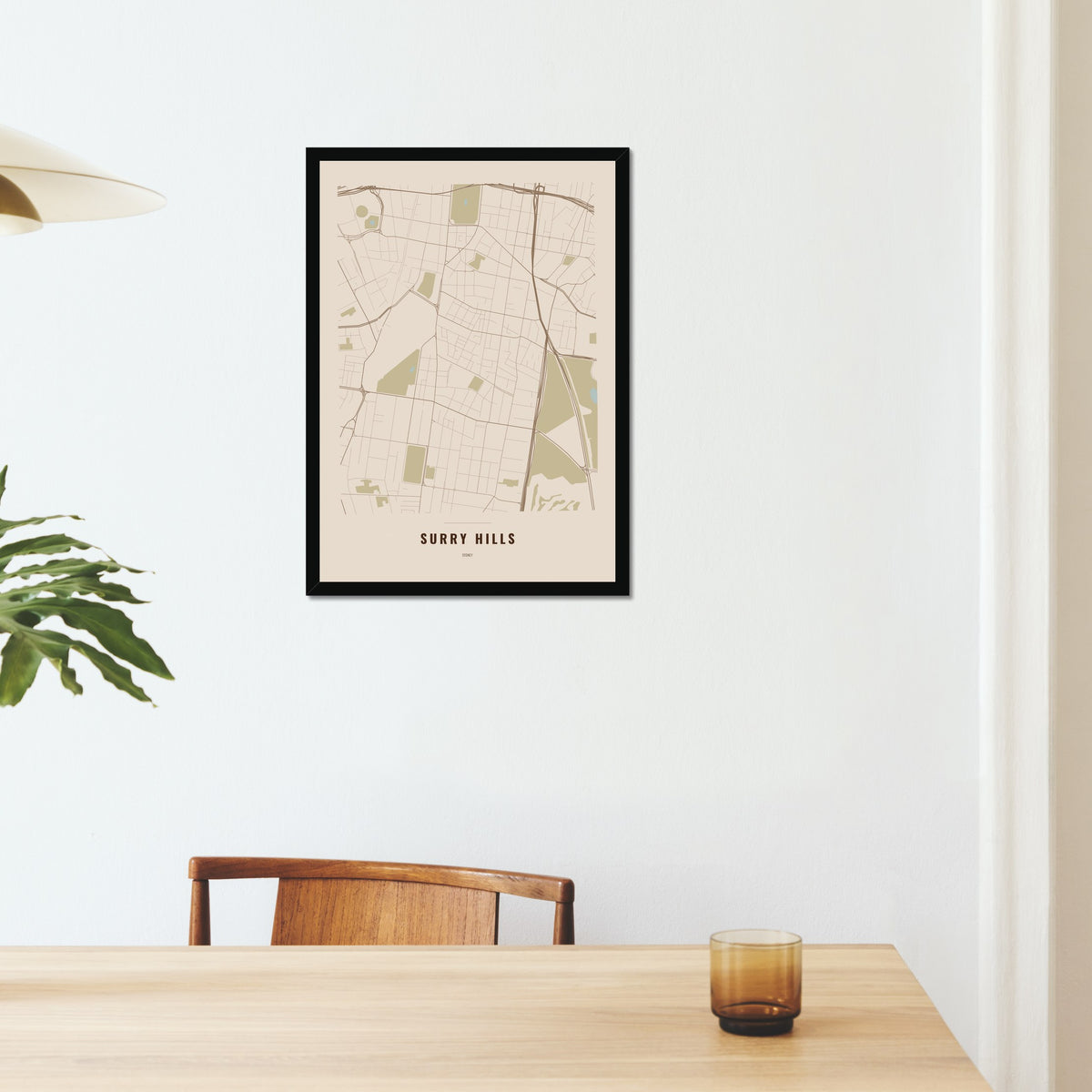 Surry Hills Map poster in a black frame on a dining room wall