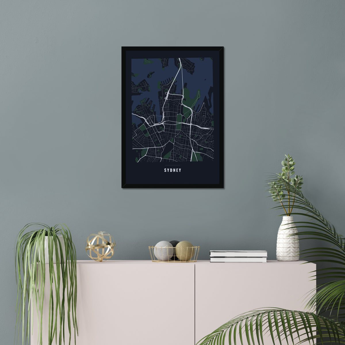 Sydney City Map poster in a black frame in a living room