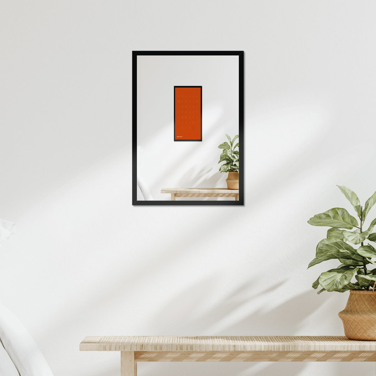 Example training block poster in a black frame above a bed