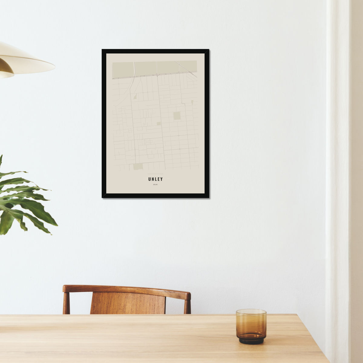 Unley Map poster in a black frame on a dining room wall