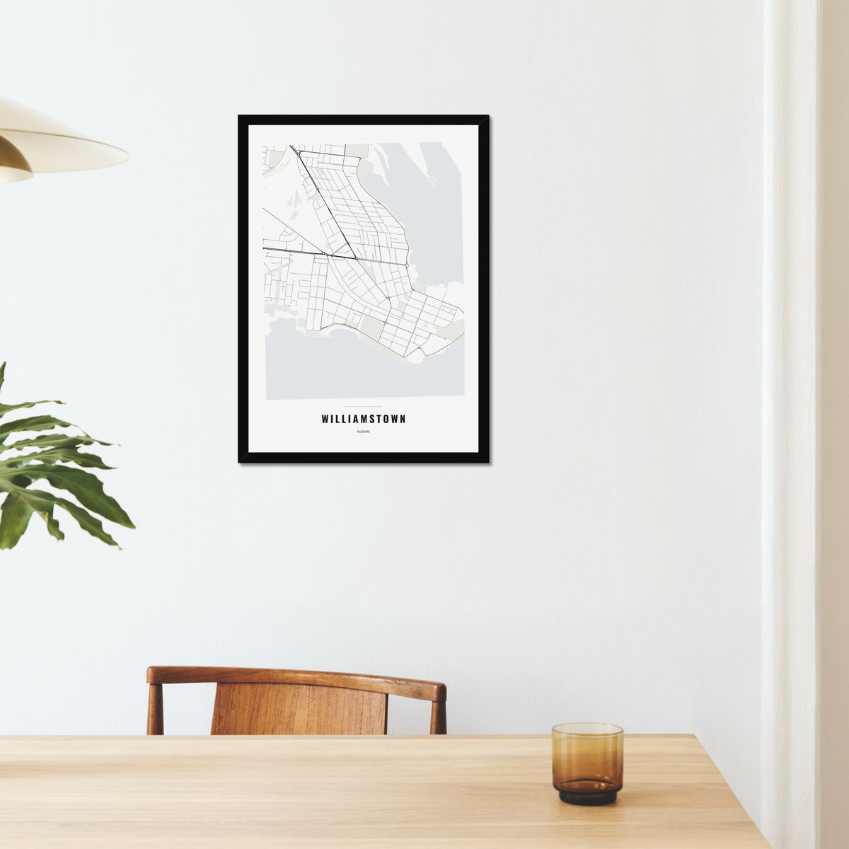 Williamstown Map poster in a black frame on a dining room wall